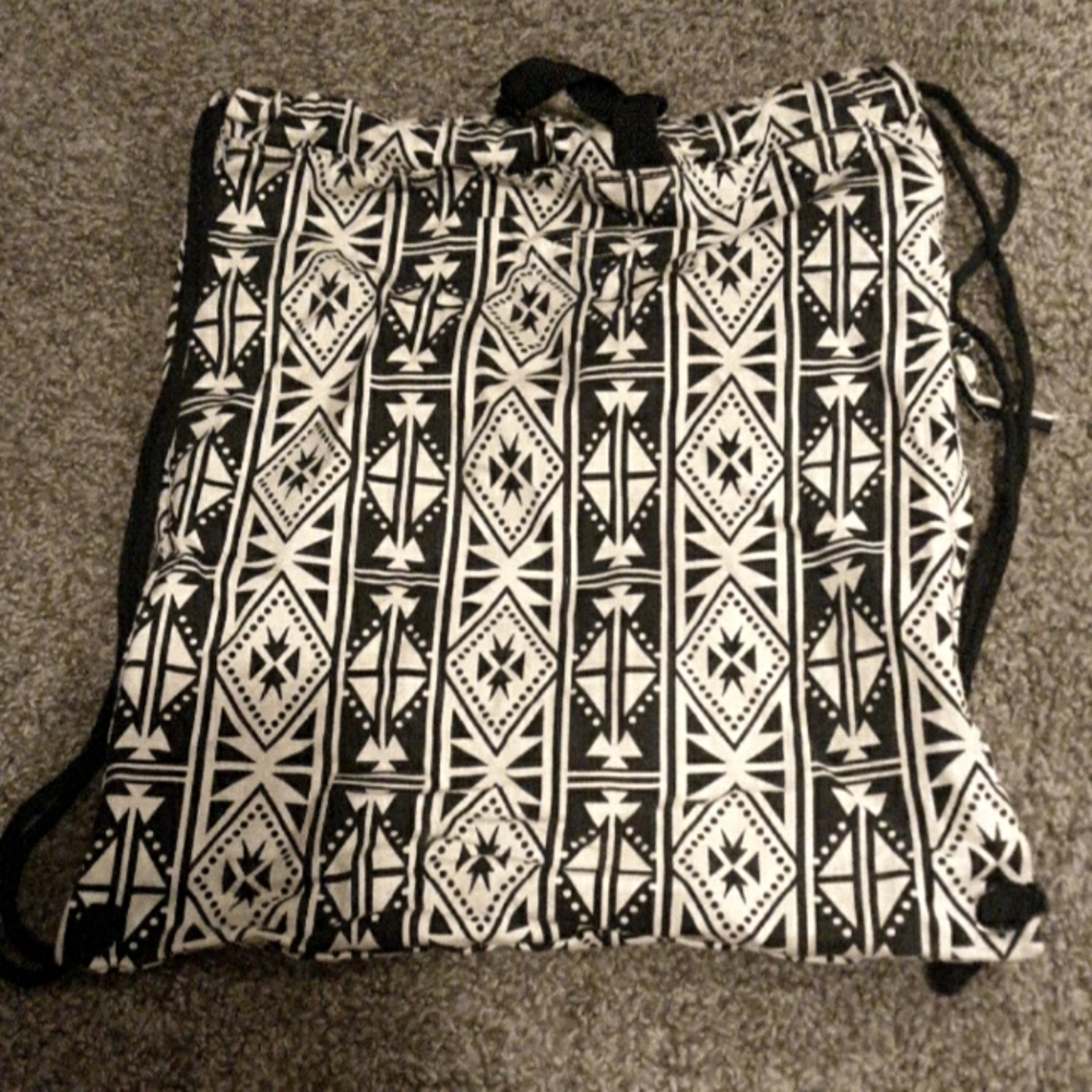 Black and white drawstring backpack